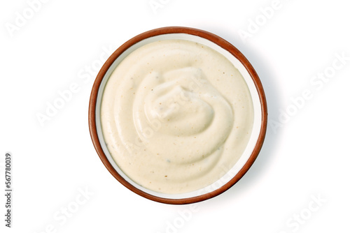 Bowl with tartar sauce or mayonnaise on white background