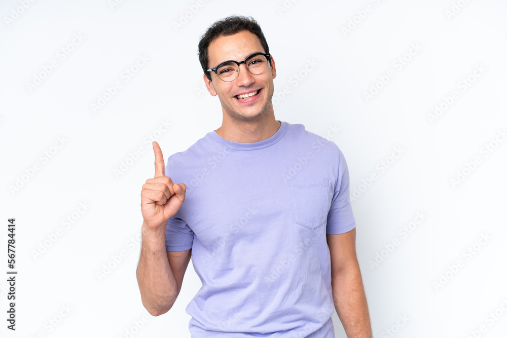Young caucasian man isolated on white background showing and lifting a finger in sign of the best Young caucasian man isolated on white background showing and lifting a finger in sign of the best