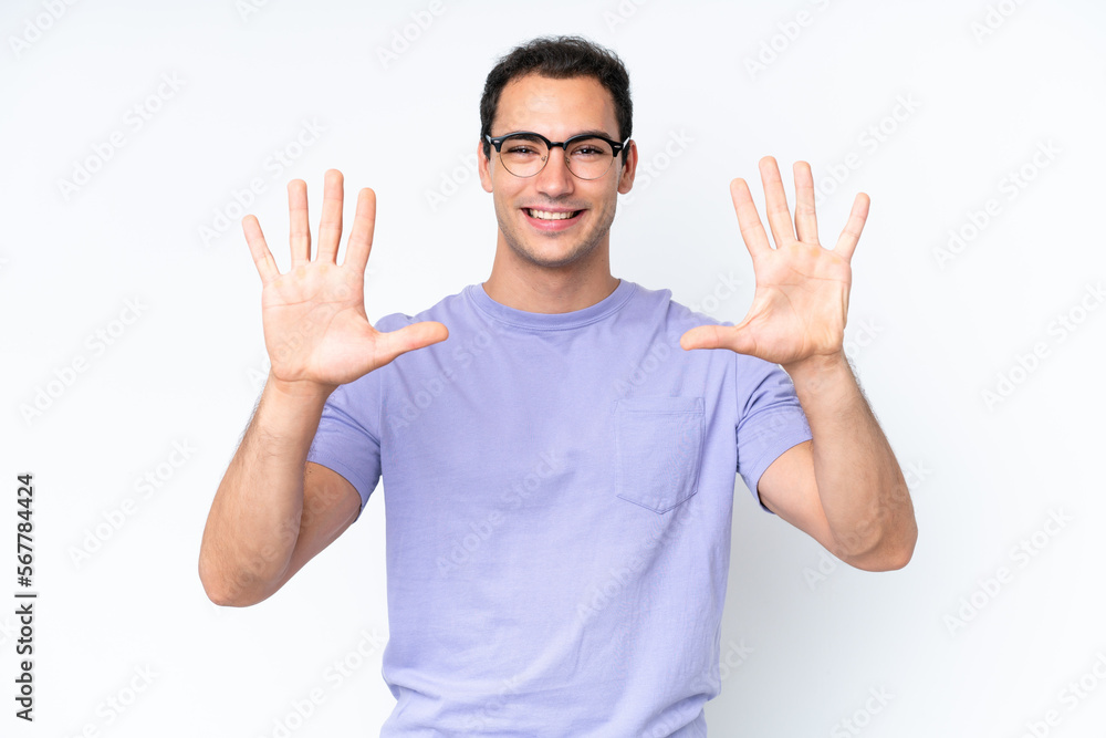 Young caucasian man isolated on white background counting ten with fingers Young caucasian man isolated on white background counting ten with fingers