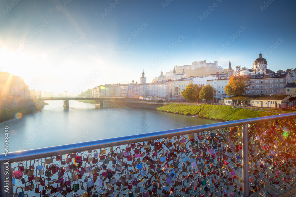 Beautiful view of Salzburg from Salzach River at misty sunrise, Austria