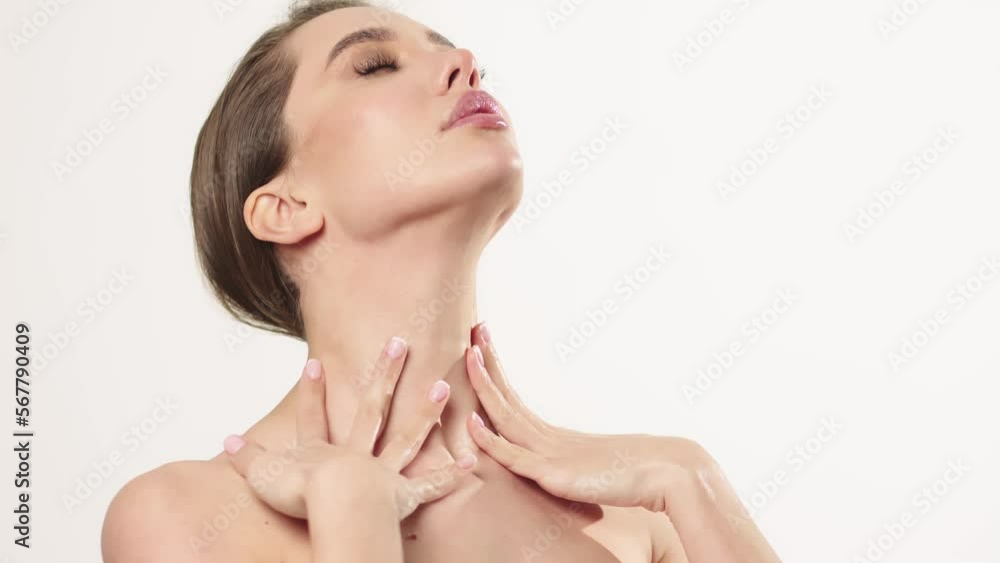 Skincare concept. Close-up beauty portrait of young woman with touching her smooth and healthy skin Skincare concept. Close-up beauty portrait of young woman with touching her smooth and healthy skin