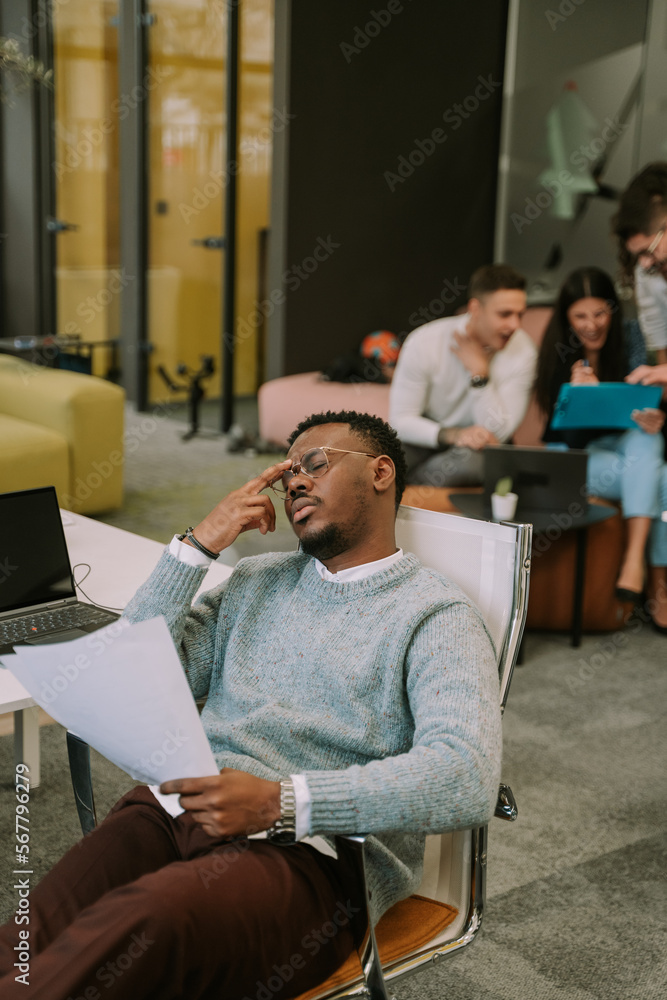 Tired black person felt asleep at work after rough day Tired black person felt asleep at work after rough day
