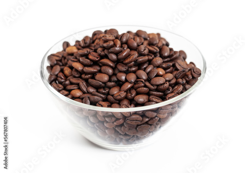 Glass bowl plate with fresh raw aroma coffee beans on white background.