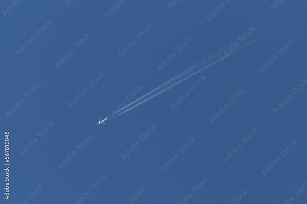 aircraft flying in a clear blue sky aircraft flying in a clear blue sky