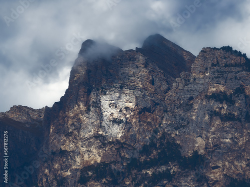 Night impressive silhouette of a skull on a high stone cliff  a mystical natural place in the Caucasus Mountains. Mountain spirit manifested in stone.