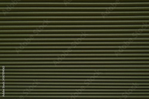 Fototapeta Naklejka Na Ścianę i Meble -  Roller blinds on the window. The texture of roller blinds. Background of stripes