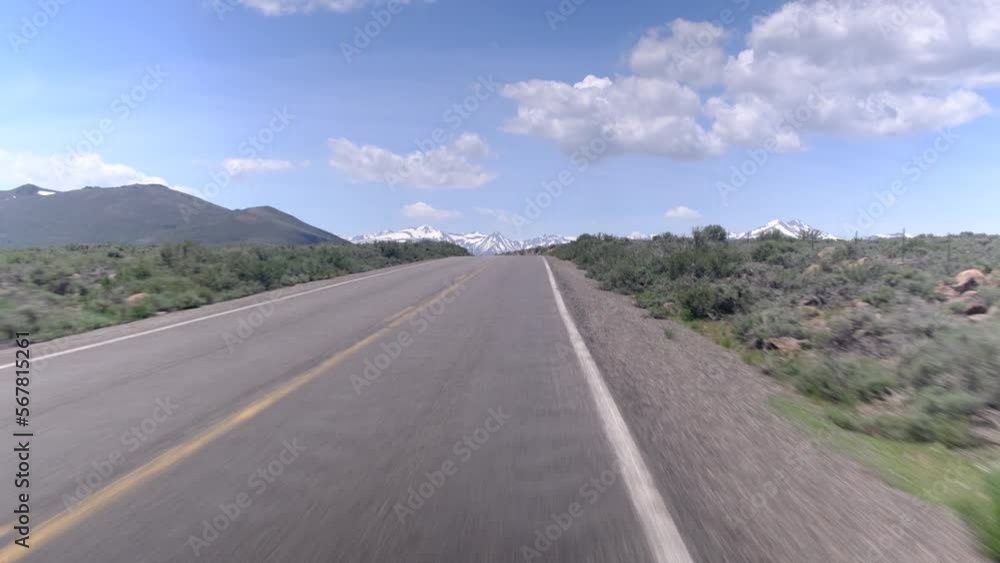 driver's point of view view road without vehicles with lines empty yellow highway with national parks landscape usa concept freedom travel adventure loneliness choose your path lifestyle