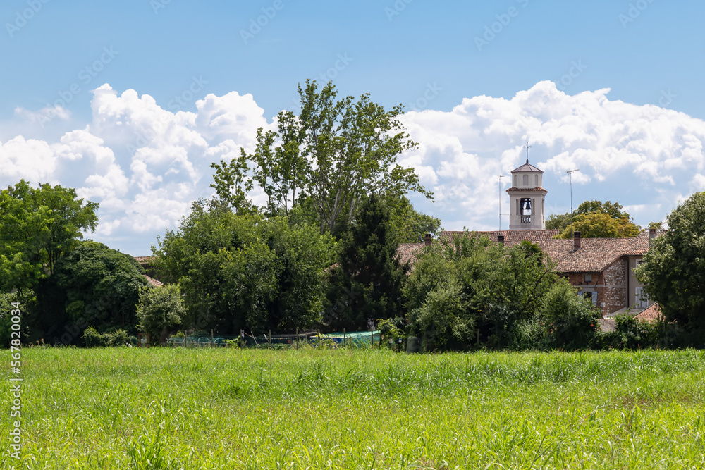 Church tower of Sant'Antonio Abate in the hamlet of Belvedere in Aquileia, Udine; Italy.