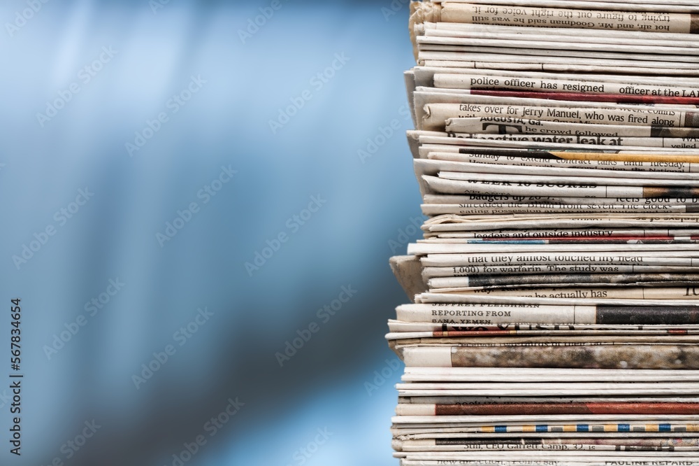A pile of dusty, old magazines on background A pile of dusty, old magazines on background