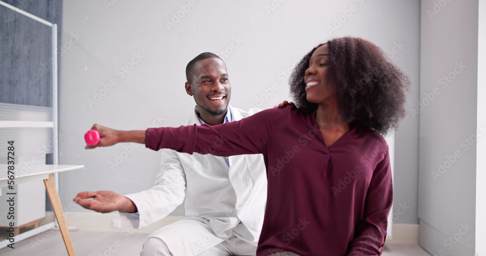 Fototapeta premium Physical Rehabilitation Therapist Helping Man