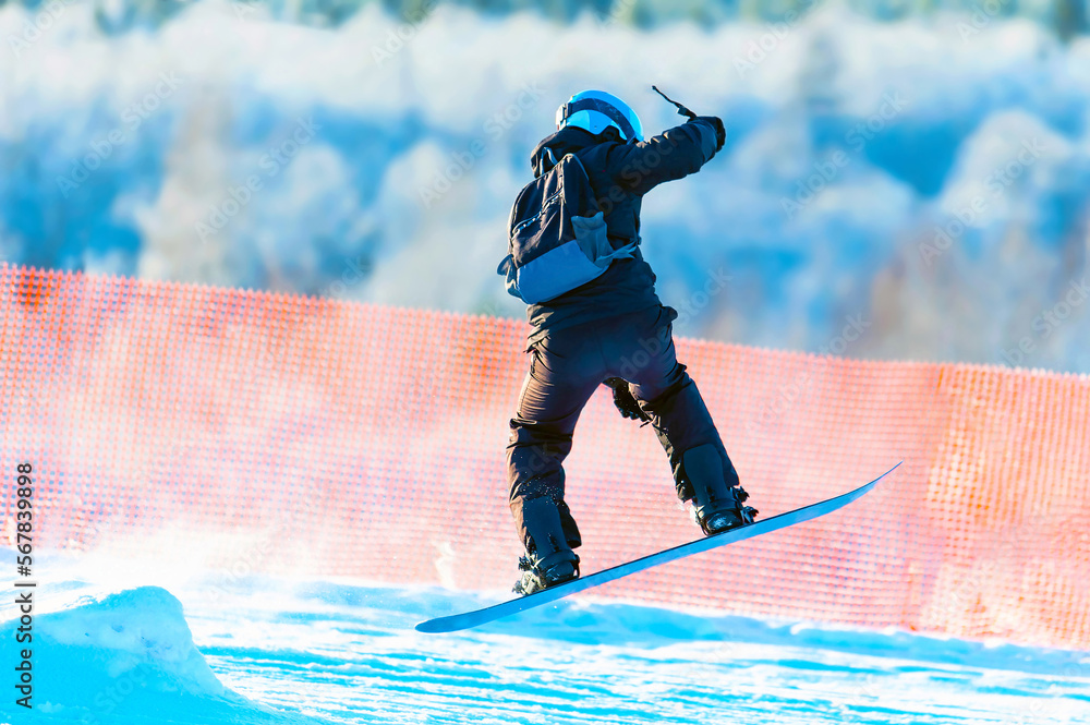 custom made wallpaper toronto digitalSnowboarder on a snowboard jumps in high mountains. Snowboarding,training at the school of extreme sports.