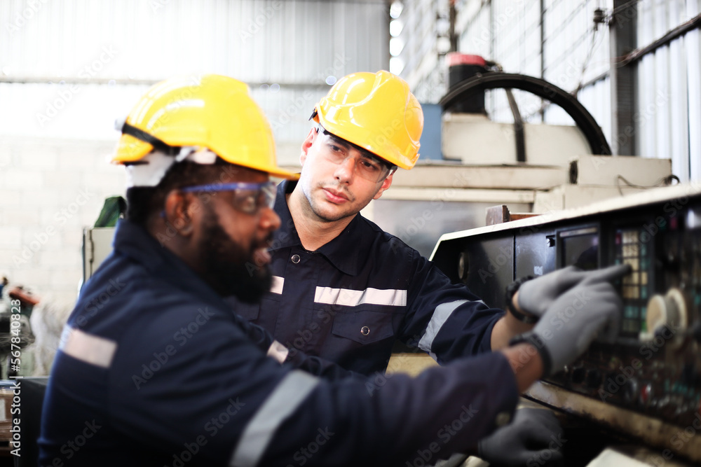 engineer teaching robot welding machine , he explanation how to working of robot arm , all function is controlled by remote engineer teaching robot welding machine , he explanation how to working of robot arm , all function is controlled by remote