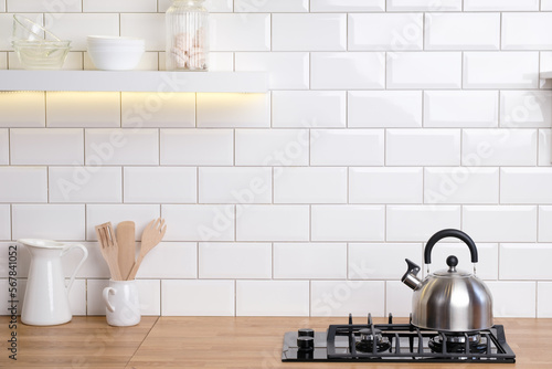 Kettle in white spacious luxury modern kitchen interior