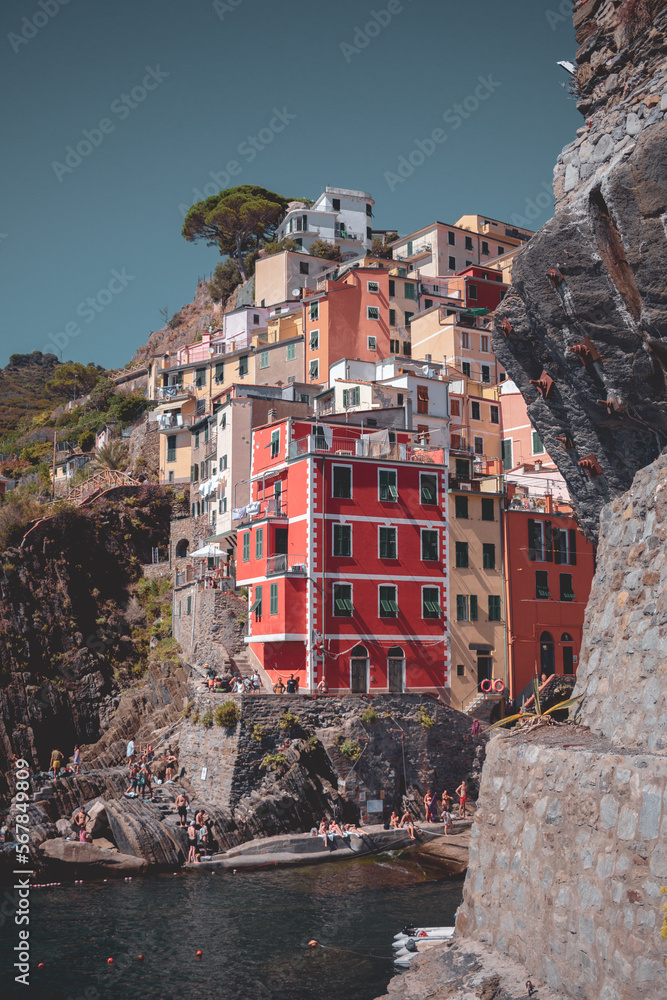 View on the colorful houses and the sea along the coastline of Cinque Terre area in Riomaggiore