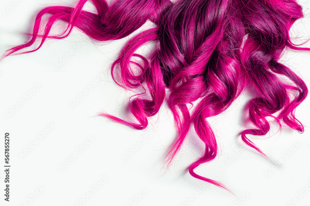 long pink curly hair on isolated white background long pink curly hair on isolated white background