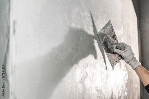 Fotografie application of insulation to the wall against moisture and water