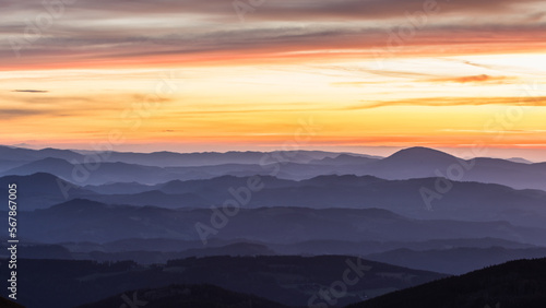 Mountain layers with a dramatic sky before sunrise © Photofex