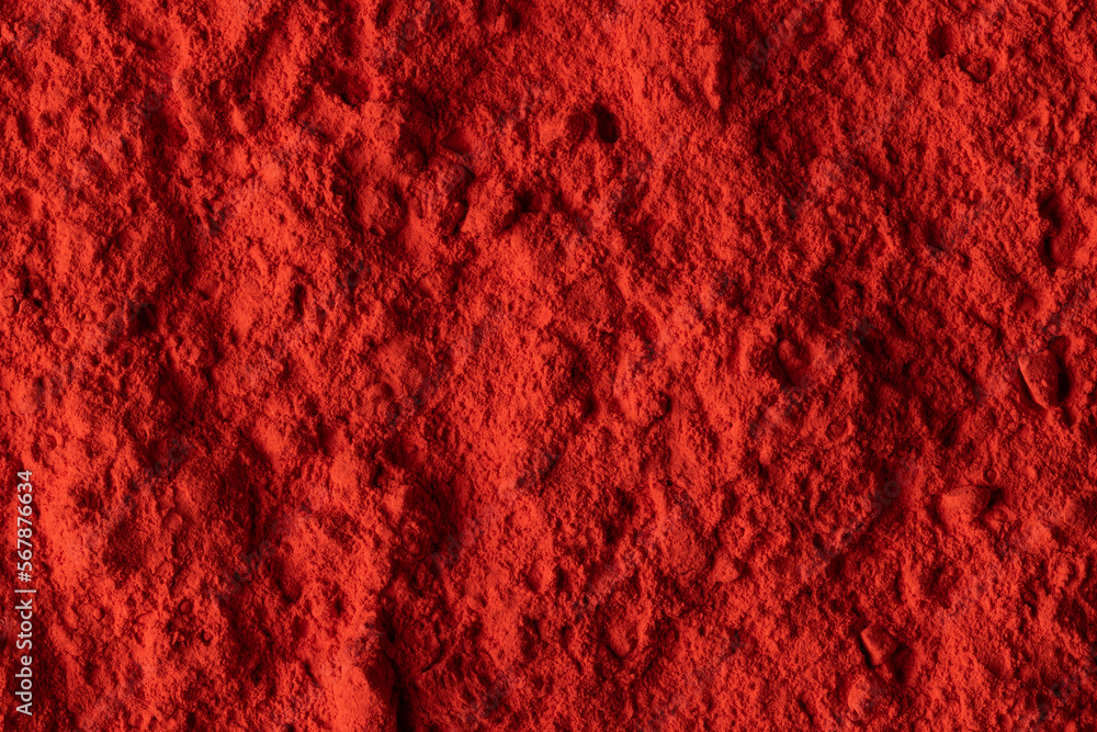 Fototapeta premium Close up of red powder background, with copy space