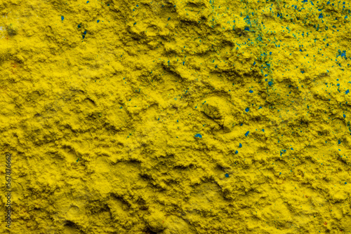 Close up of yellow and green powder background, with copy space