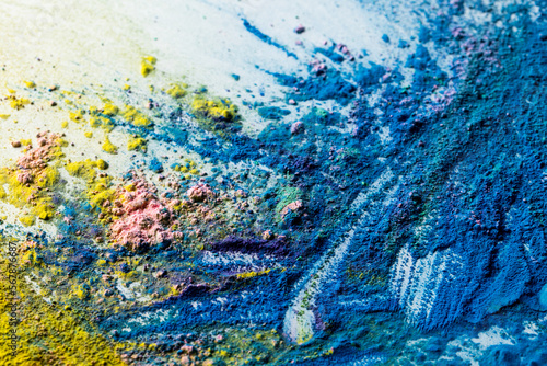 Close up of multi coloured powder with copy space
