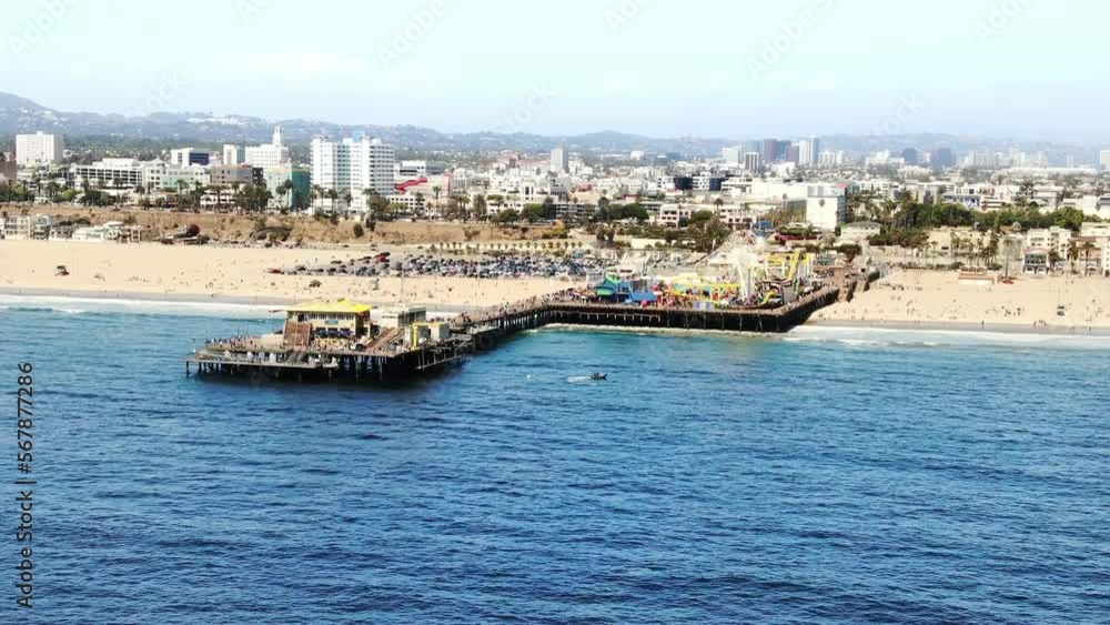 Aerial view of Santa Monica pier, oceanfront amusement park, tourist attraction in LA. Popular tourism destination in summer in America.
Aerial view of Santa Monica pier, oceanfront amusement park, tourist attraction in LA. Popular tourism destination in summer in America.