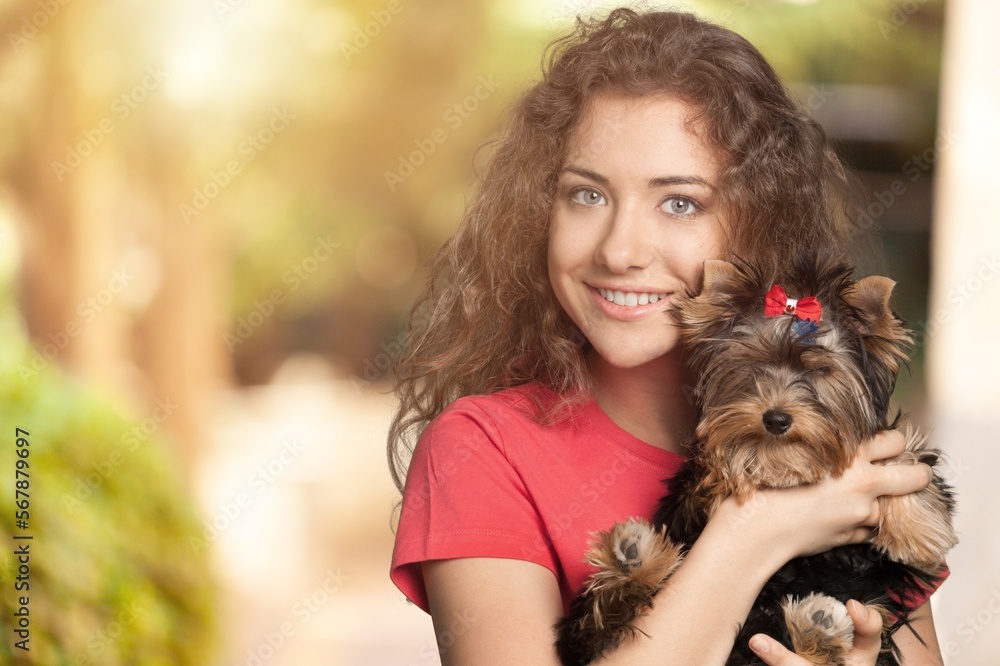 Happy young woman hugging dog pet Happy young woman hugging dog pet