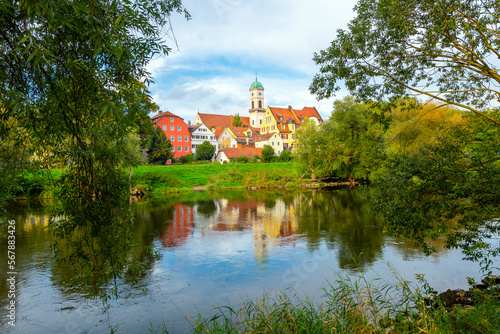 View of the Rococo style St. Mang Church and monastery complex in the Stadtamhof village island area, across the Danube River from the Bavarian town of Regensburg, Germany.