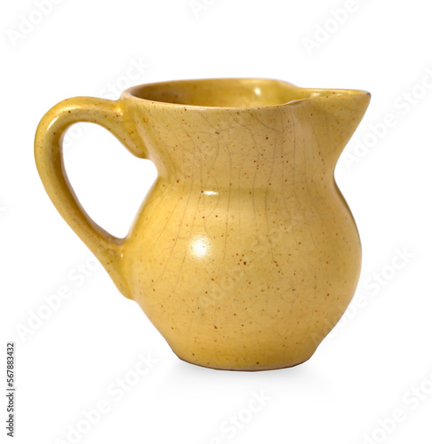 earthenware yellow jug isolated on white background
