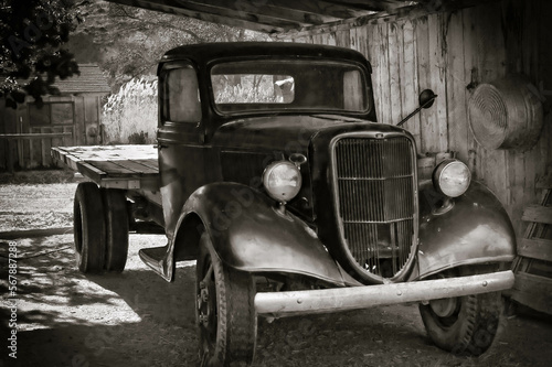 American Vintage truck year 1930, on a barn of Utah, USA - black and white picture