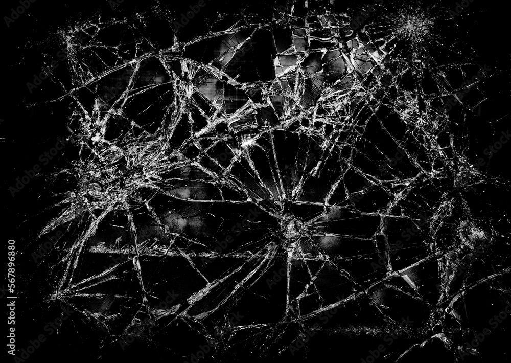 Pieces of destructed Shattered glass. Royalty high-quality free stock photo image of broken glass with sharp pieces. Break glass white and black overlay grunge texture abstract on black background - obrazy, fototapety, plakaty 