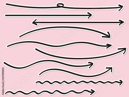ステッカーのように白い縁取りのある手書きの長い矢印セット