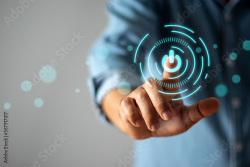 Businessman touching start button , technology concept, future photo