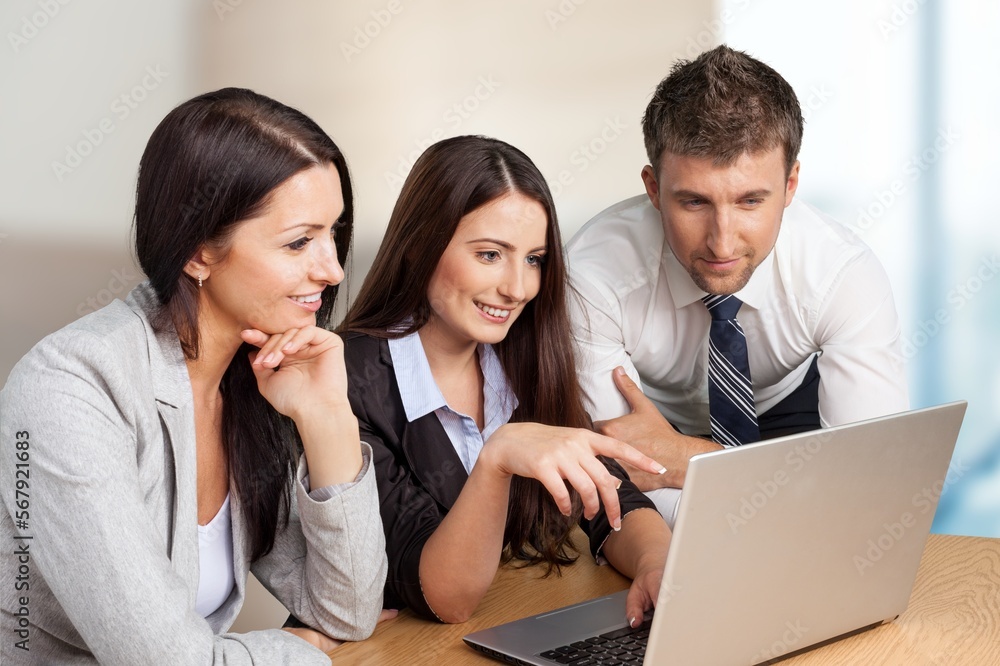 Happy business team work in modern workspace Happy business team work in modern workspace