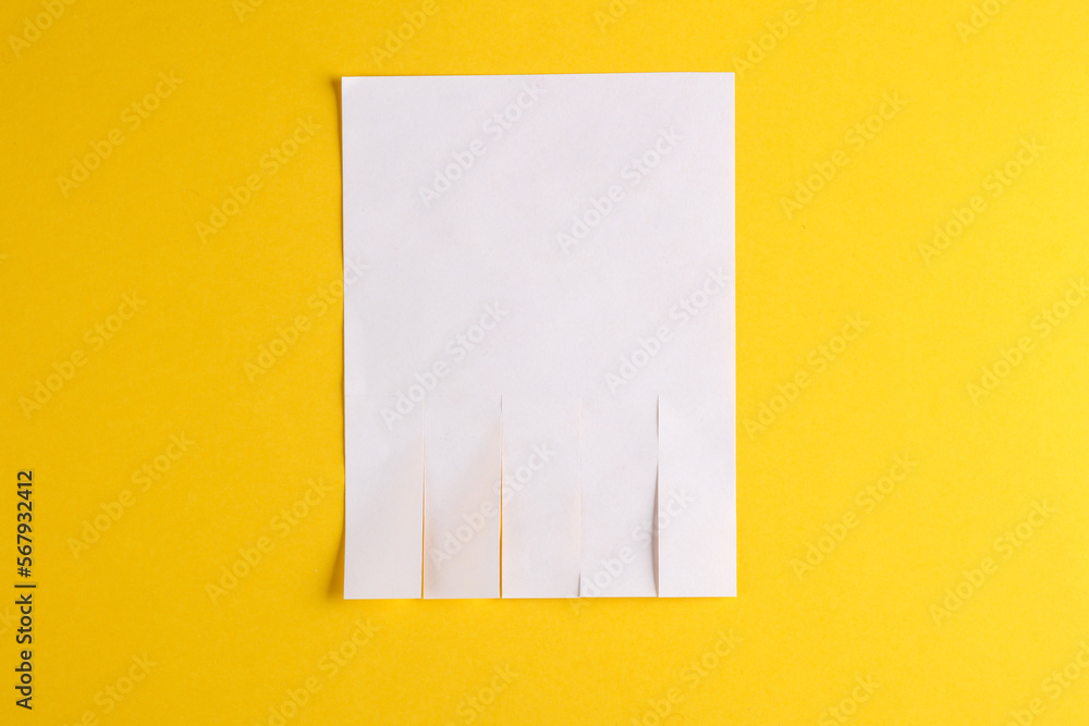 White mockup of white wall ad with space for phone numbers on yellow background White mockup of white wall ad with space for phone numbers on yellow background