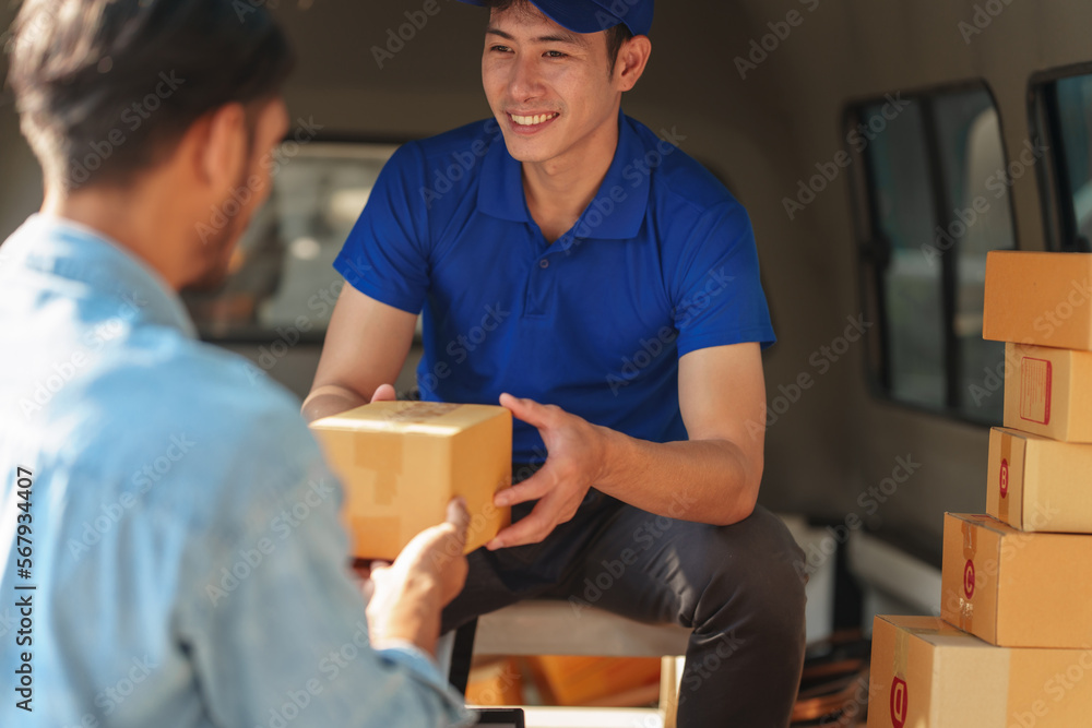 Delivery man asia people checking portable delivery device with parcel box to customer home address. Delivery man asia people checking portable delivery device with parcel box to customer home address.