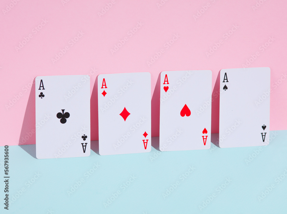 Four aces on blue pink pastel background. Creative layout Four aces on blue pink pastel background. Creative layout