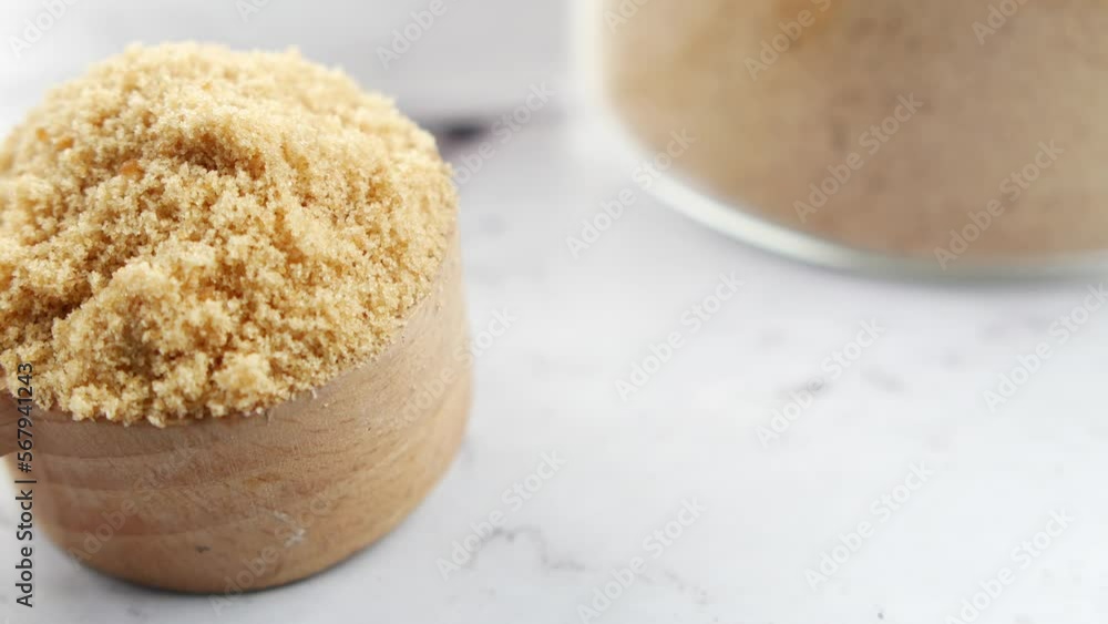 coconut sugar in a white bowl on table coconut sugar in a white bowl on table