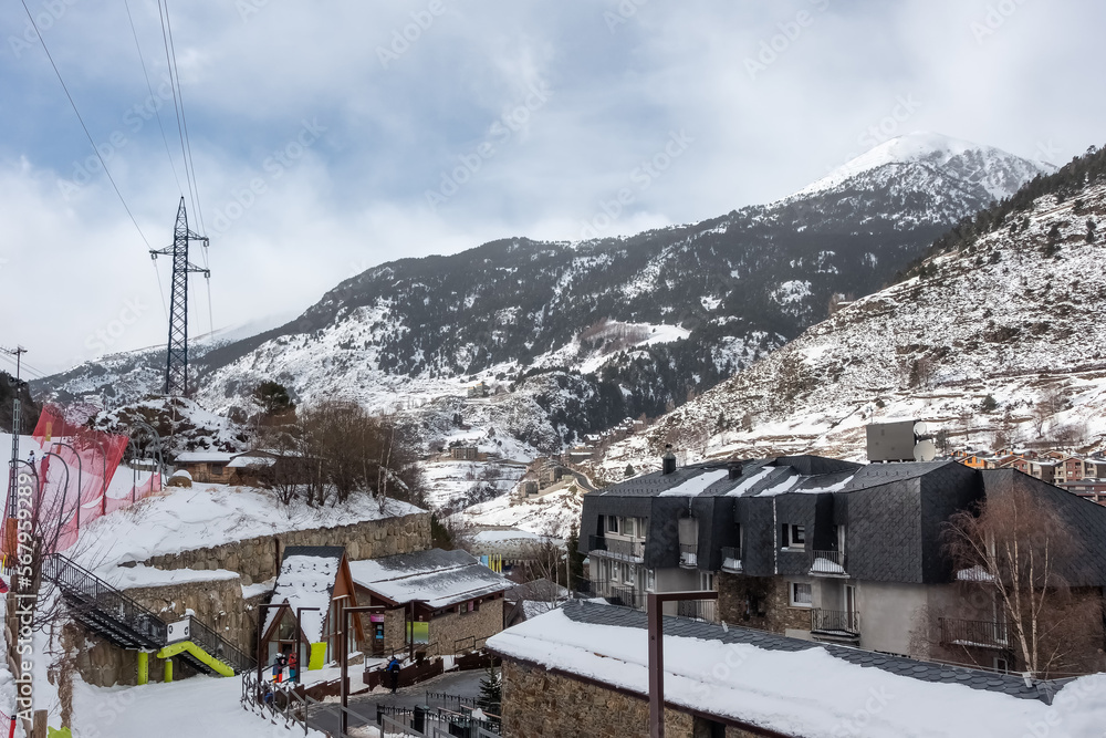 Urbanization of mountain houses next to the ski slopes in the Pyrenees, El Tarter, Andorra.