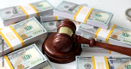 Judicial gavel on dollar money and financial crimes photo