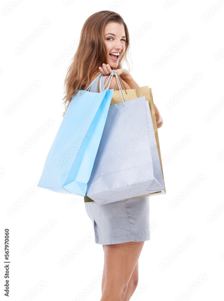 Woman, shopping bags and portrait smile with wink standing isolated on a white studio background. Happy attractive female shopper carrying gifts and smiling in happiness for sale, discount or deal