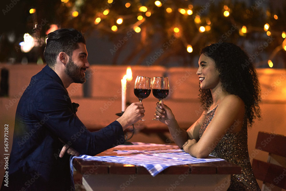Love, wine and toast of couple on date for fine dining, restaurant or night  valentine celebration together. Happy black woman with romance partner  alcohol glass, celebrate and luxury in night bokeh Stock