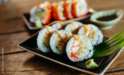 Sashimi, Sushi salmon & tuna sushi shrimp and wasabi on the wood table