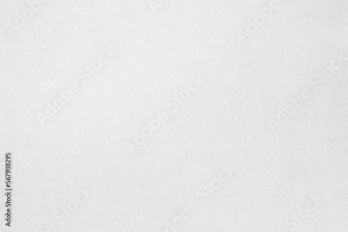 White cardboard craft paper background. Grey paper texture, old vintage page or grunge. 