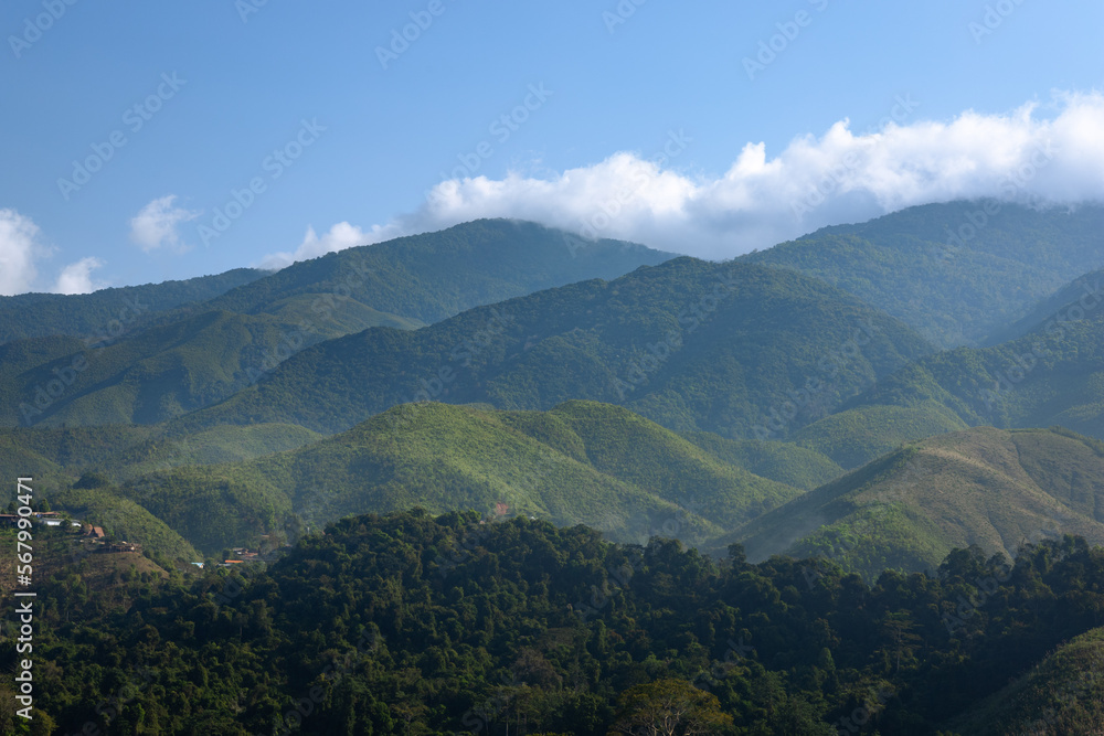Fototapeta premium Mountains landscape with morning mist in Nan, Thailand.