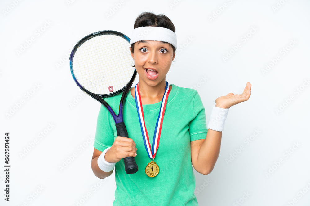 Young tennis player woman isolated on white background with shocked facial expression Young tennis player woman isolated on white background with shocked facial expression