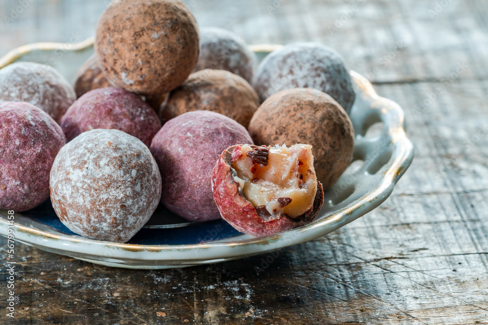 Obraz premium Assortment of chocolate truffles. Selective focus