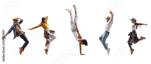 African american guy performing a handstand and other people dancing
