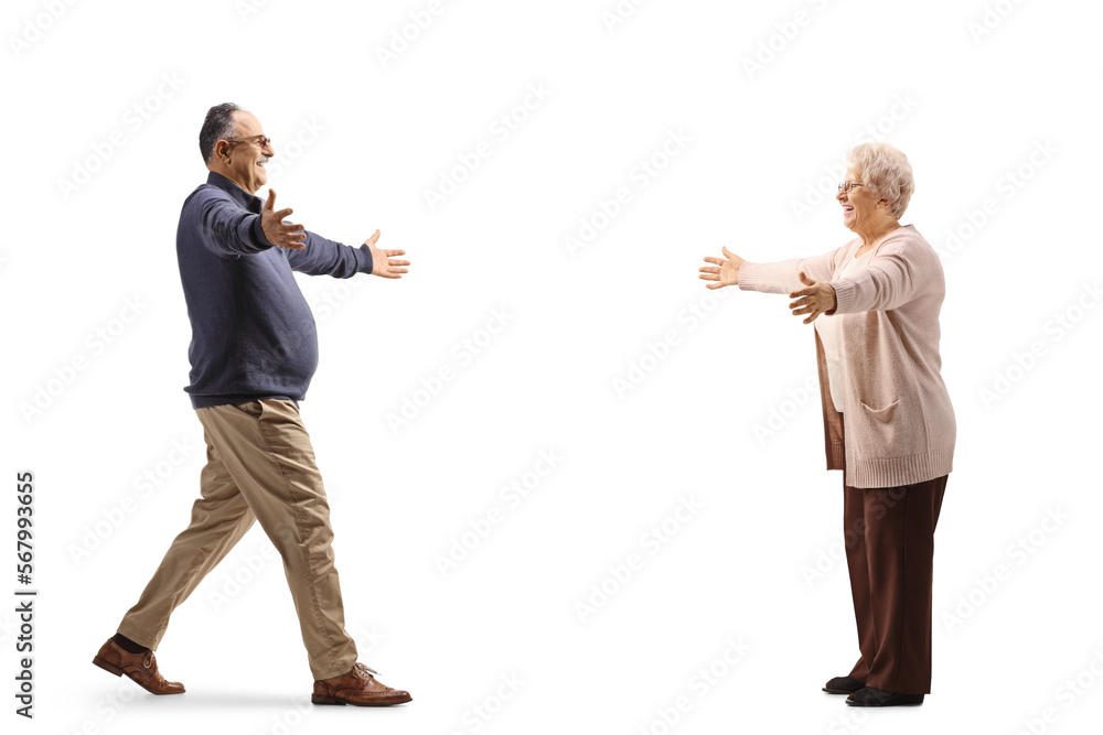 Full length profile shot of a happy mature man meeting an older woman Full length profile shot of a happy mature man meeting an older woman