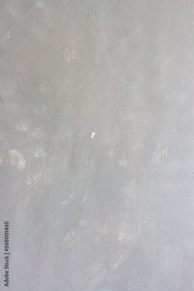 Obraz premium Gray concrete vertical wall background with spots