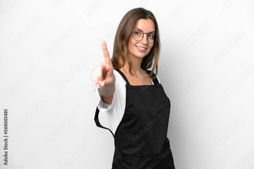 Young caucasian restaurant waiter woman isolated on white background showing and lifting a finger Young caucasian restaurant waiter woman isolated on white background showing and lifting a finger
